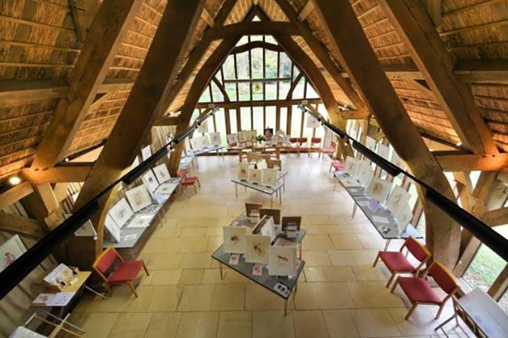 Looking down on an exhibition in the Great Oak Hall