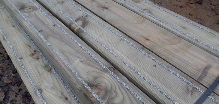 Thick timber decking with grip strips
