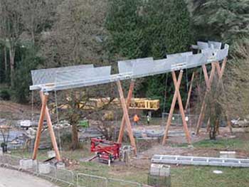 A stunning aerial shot of the walkway snaking into the trees