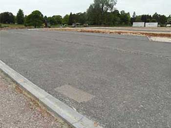 This image shows the footpath (in the left corner of the picture), disabled parking bays, road and coach drop off and pick up point close to the Welcome Building