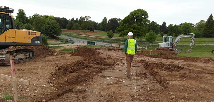Director Simon Toomer walks on what will be the new footpath from the car park to the Welcome Building. Once complete you will be able to see the new building directly in front of where Simon is standing