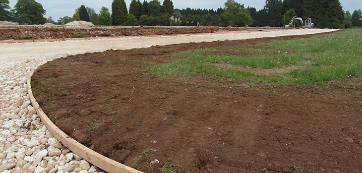 The timber curved kerb for the additional car parking - visitors using this area will park on grass on busy days