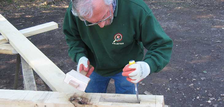 Michael Goom cutting housing in tie beam for roof A frame Michael Goom cutting housing in tie beam for roof A frame